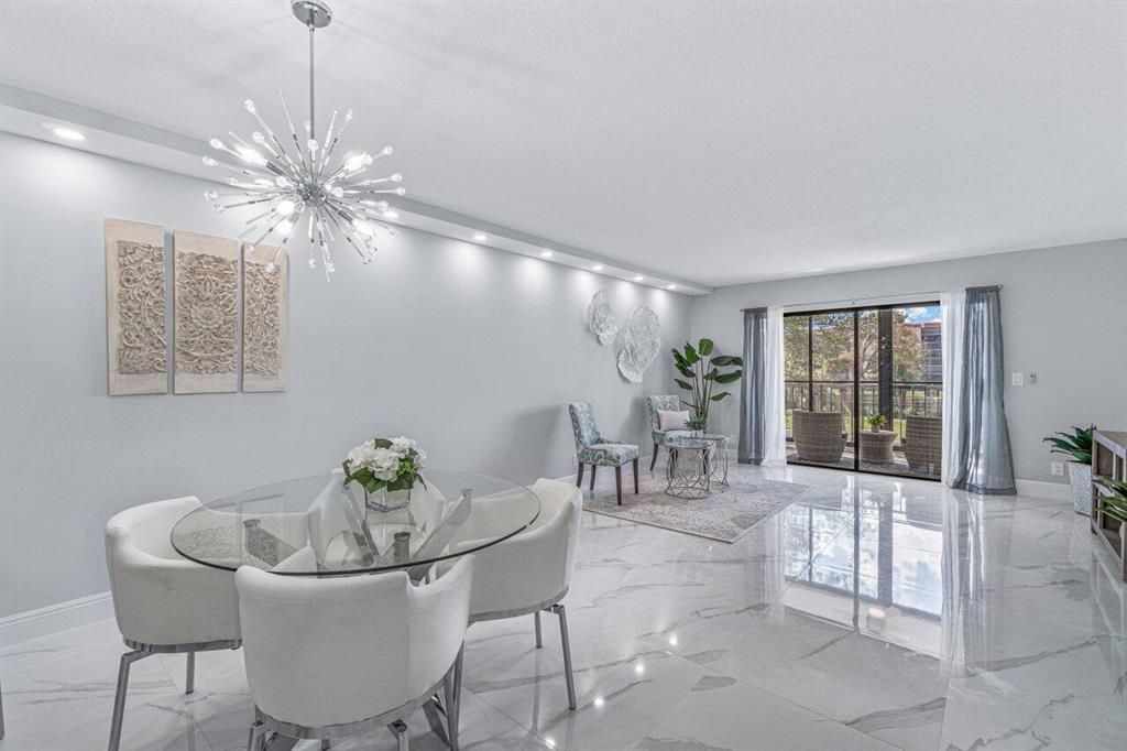 Photo of 7290 Kinghurst Drive #310, Delray Beach, FL 33446 (MLS # R10781685)