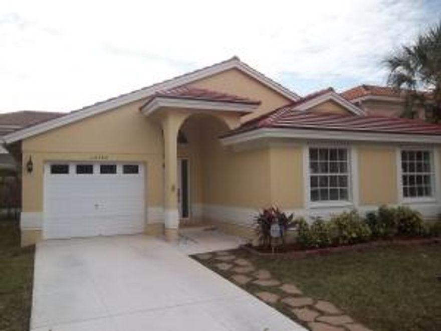 This home sits in a quiet community of Hidden Lake in Boca Chase with screen in a patio, vaulted ceilings, granite counter tops, stainless refrigerator, wood cabinets with self return drawers, tennis courts, 3 community pool, close to shopping, near South Regional Park, has an alarm system, hurricane shutters, community pays for basic cable,great schools. Brand new roof Oct 2016. Freshly painted inside and out. Pressure cleaned and new landscaping.
