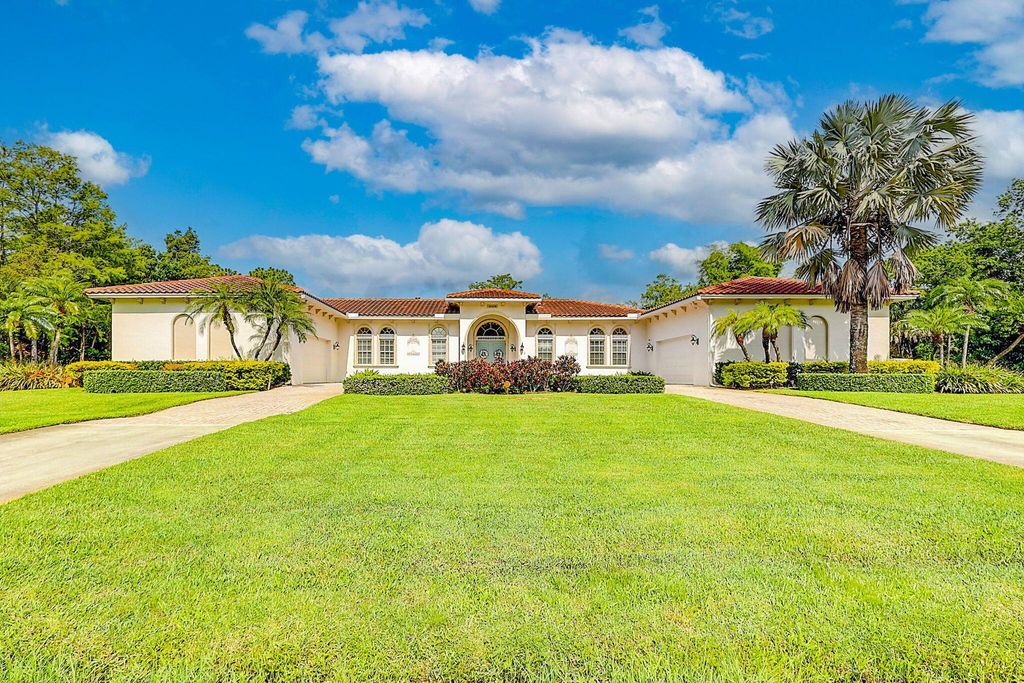 Photo of 15655 77th Trail N, Palm Beach Gardens, FL 33418 (MLS # R10899094)