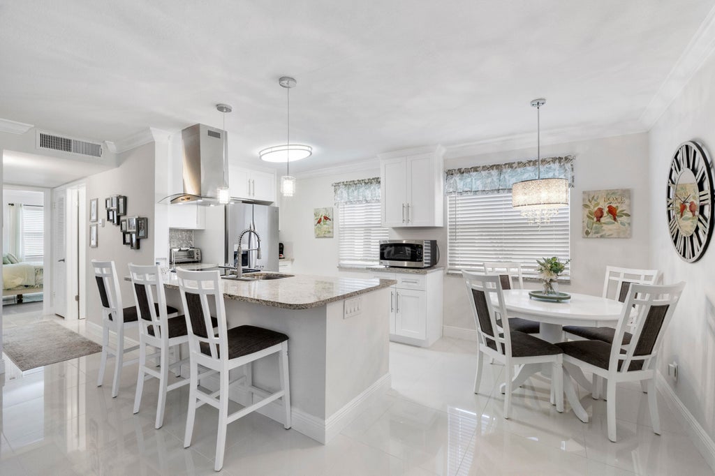 Photo of 197 Normandy Lane #E, Delray Beach, FL 33484 (MLS # B26089515)