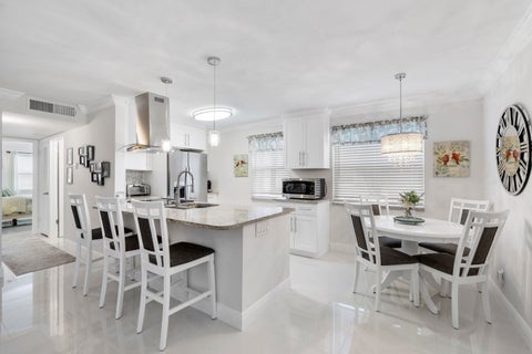 Photo of 197 Normandy Lane #E, Delray Beach, FL 33484 (MLS # B26089515)