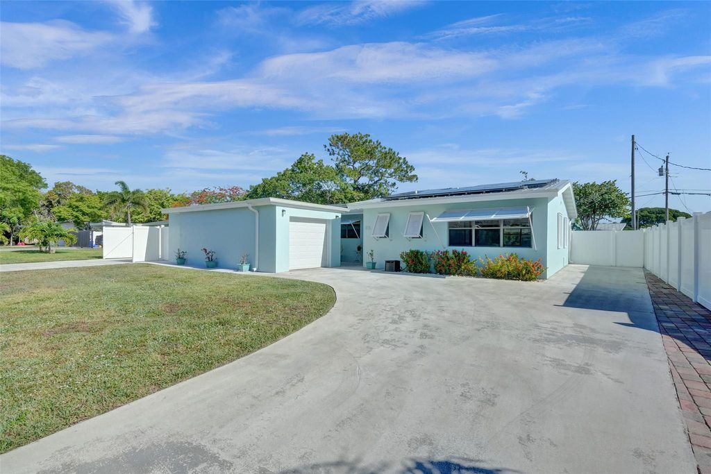 Photo of 836 Buttonwood Road, North Palm Beach, FL 33408 (MLS # F10439006)