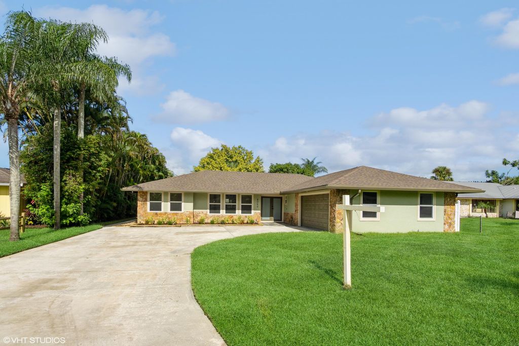 Photo of 8040 SE Colony Drive, Stuart, FL 34997 (MLS # R10929501)