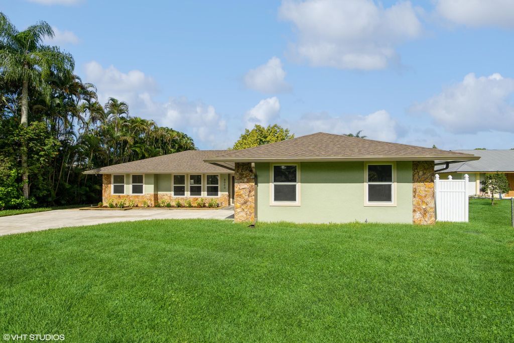Photo of 8040 SE Colony Drive, Stuart, FL 34997 (MLS # R10929501)