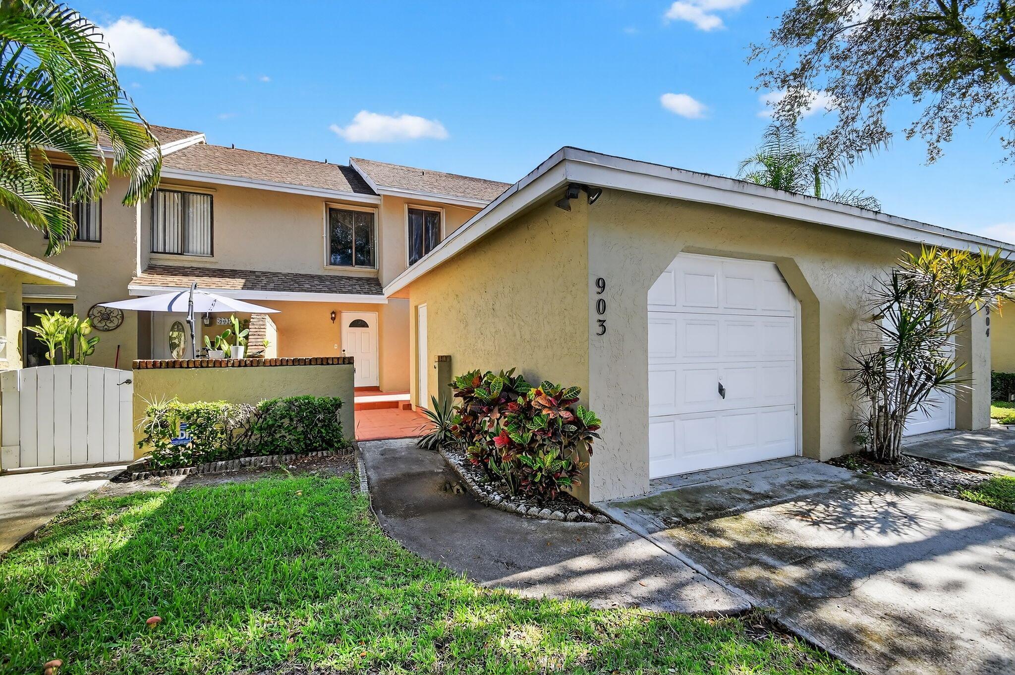Nestled in the quiet, charming community of Jogger's Run, this 2 bed, 2.5 bath townhouse boasts a beautiful water view, accordion hurricane shutters on all windows, spacious bedrooms, garage and driveway, stainless steel appliances, several neighborhood amenities, and over 1,600sq/ft of living space... all located in the heart of Greenacres.