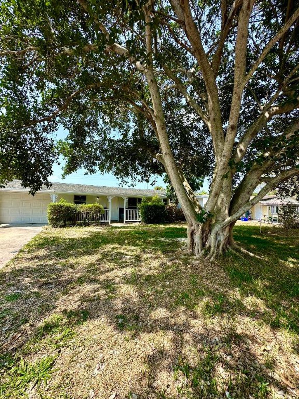 Photo of 1455 NE Silver Maple Way, Jensen Beach, FL 34957 (MLS # R10987284)