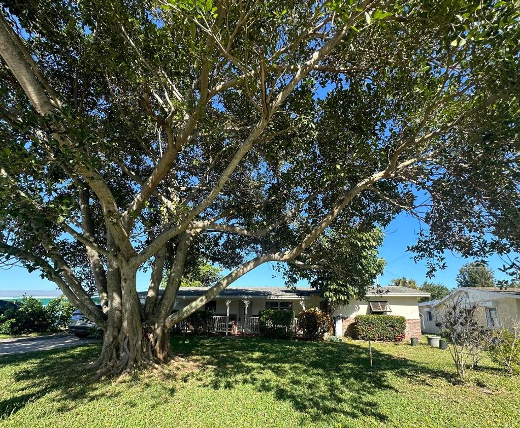Photo of 1455 NE Silver Maple Way, Jensen Beach, FL 34957 (MLS # R10987284)