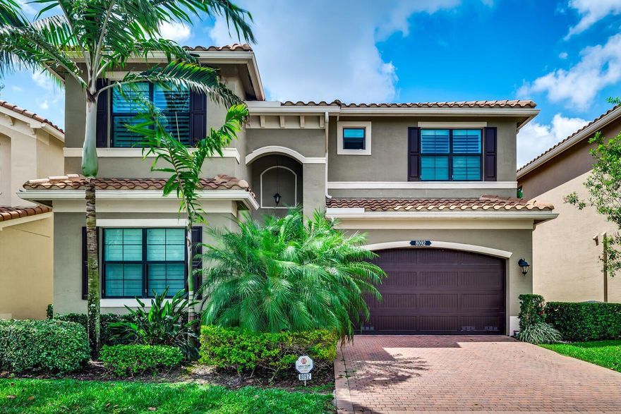 Spacious floorplan offers 5 Bedrooms, 4 Bathrooms plus a Loft/Second Floor Living Space. Many upgrades throughout home such as 32'' White Porcelain Tile throughout, Crown Molding throughout, Recessed Lighting in every room, Custom Closets, Custom Window Coverings; Relax in your Extended Paver Patio, Covered Screen Enclosure, Impact Windows & Doors, Tiled Backsplash. The Master Suite w/his/hers Custom Closets, Second Bedroom (office/den) & 2 Bathrooms are on the 1st Floor. There are Three Bedrooms & a Loft on the 2nd Floor.