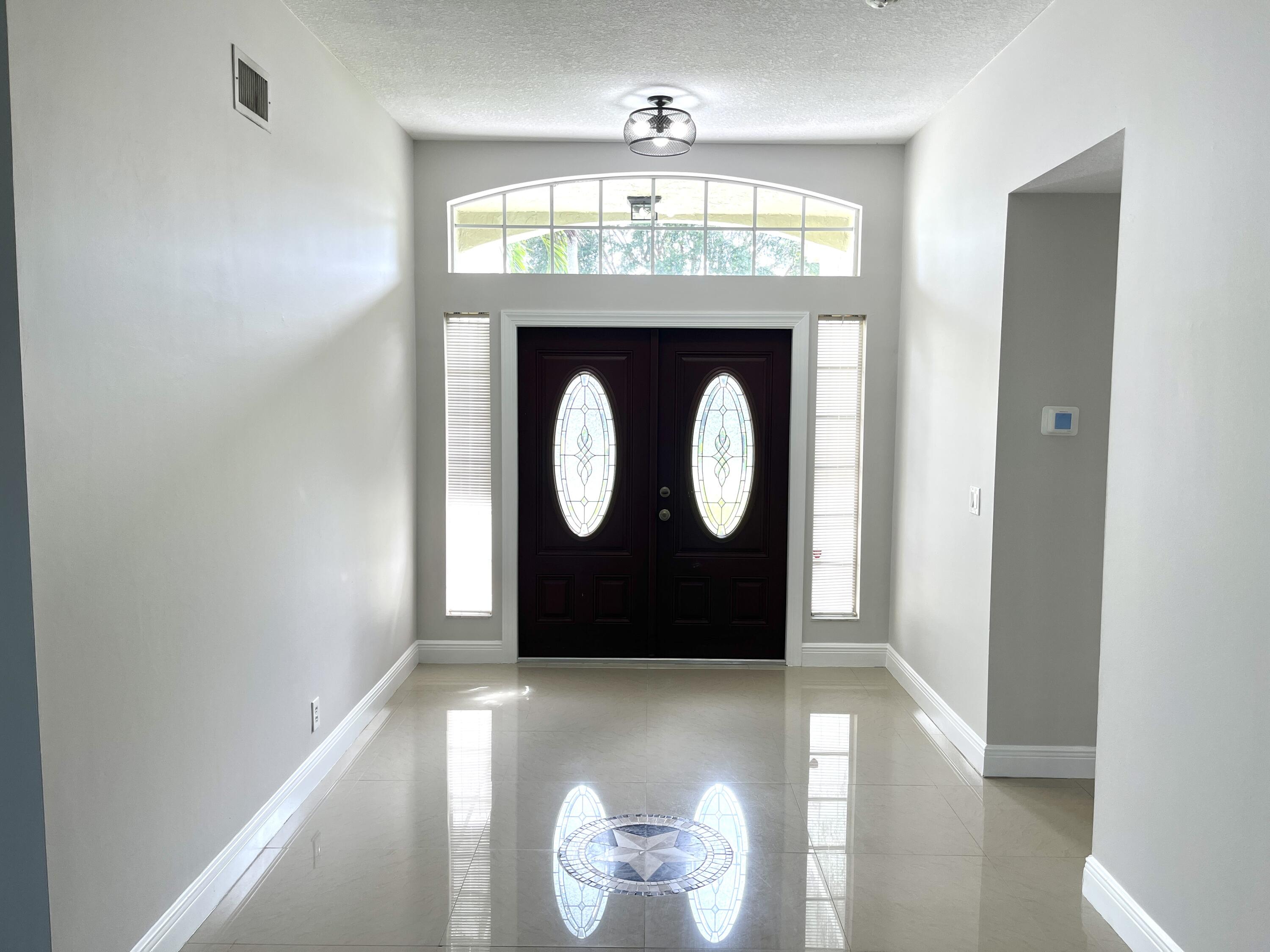 1112 Wild Cherry Lane, Wellington, FL, 33414/$568,500 2 1112 Wild Cherry Lane