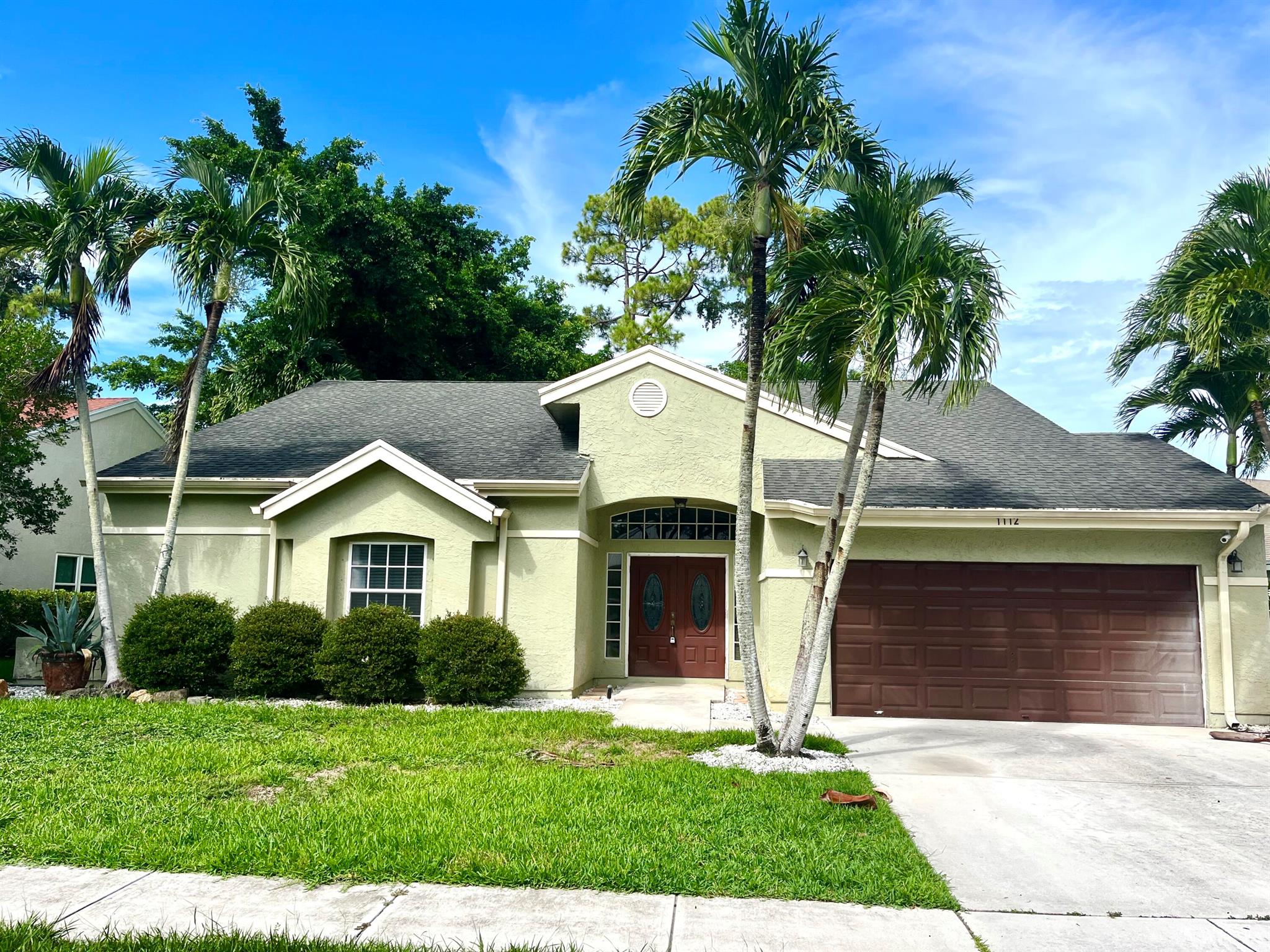 Beautiful home in Wellington, close to schools, shopping, and restaurants. This 3-bedroom 2 bath home is light and bright, on one of the largest lots in Wellington's Emerald Forest Estate Homes community. Enter through the double front doors and step onto the 24'' porcelain tile (throughout the home - no carpet). The kitchen and bathrooms have been updated. Recent exterior and interior paint. The large backyard is a quiet play area for kids and pets. Close to all shopping and restaurants, and Wellington's equestrian venues are only a few minutes away.