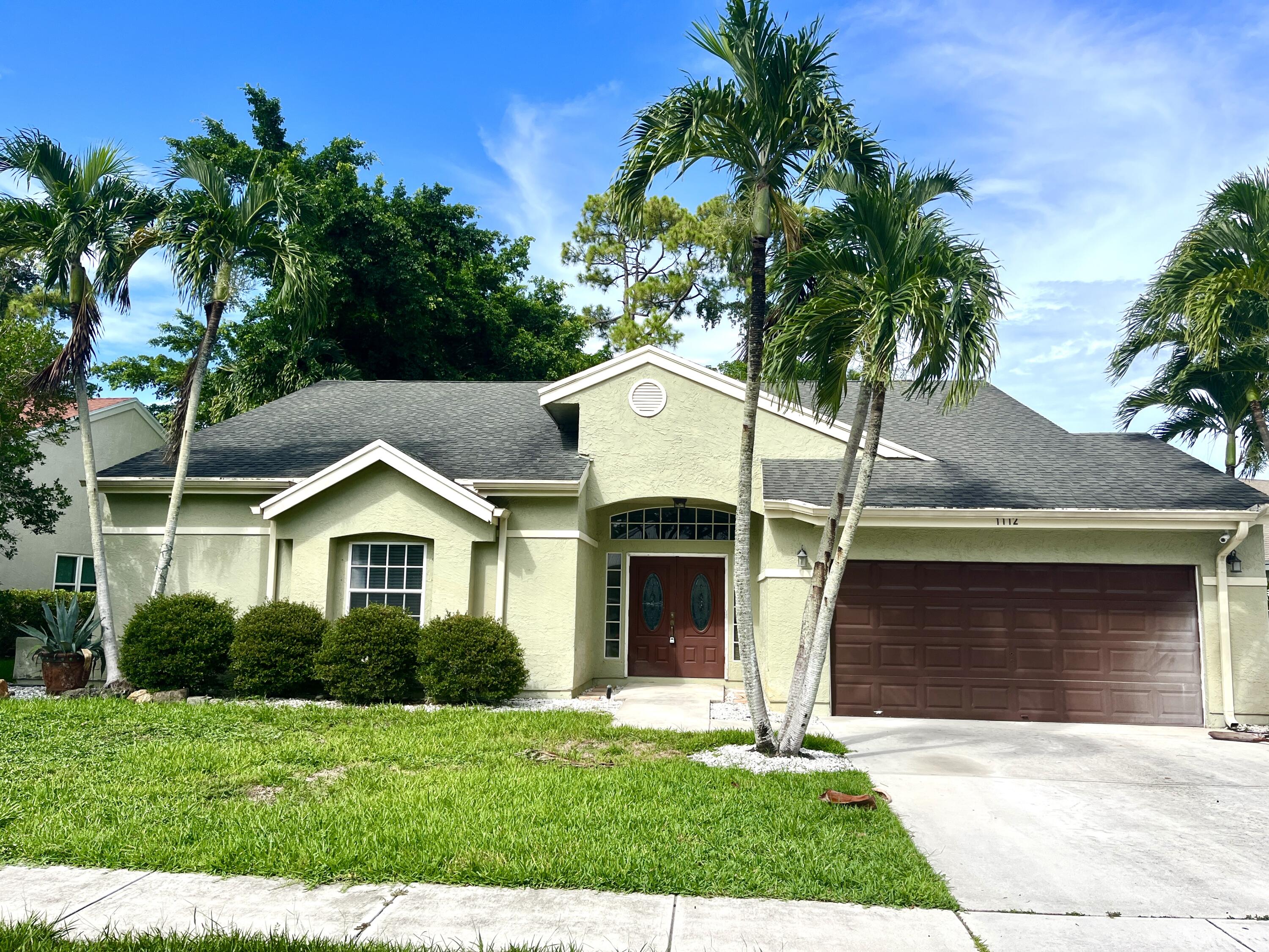 Beautiful home in Wellington, close to schools, shopping, and restaurants. This 3-bedroom 2 bath home is light and bright, on one of the largest lots in Wellington's Emerald Forest Estate Homes community. Enter through the double front doors and step onto the 24'' porcelain tile (throughout the home - no carpet). The kitchen and bathrooms have been updated. Recent exterior and interior paint. The large backyard is a quiet play area for kids and pets. Close to all shopping and restaurants, and Wellington's equestrian venues are only a few minutes away.