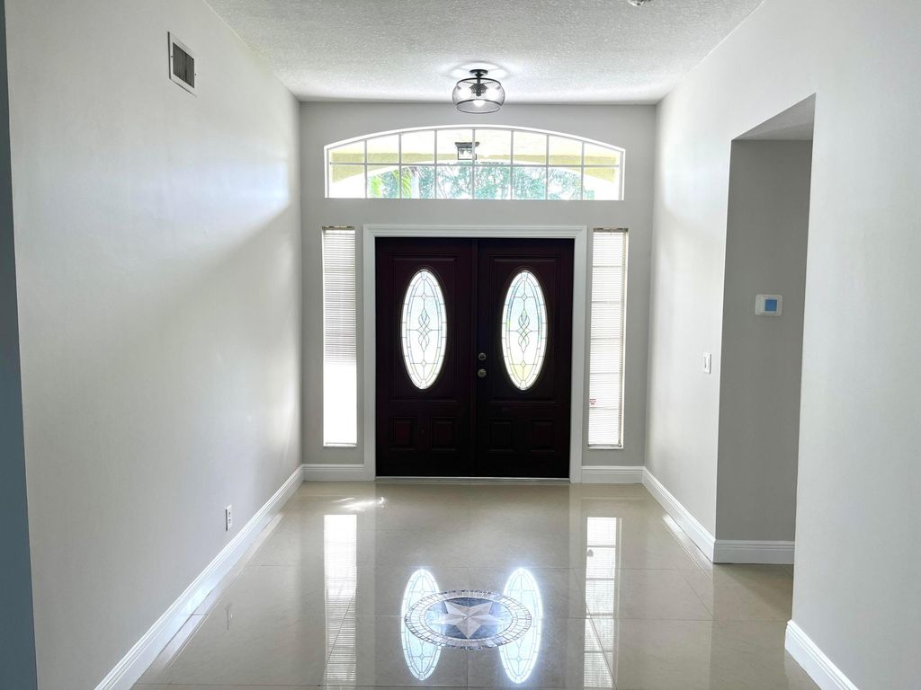 Photo of 1112 Wild Cherry Lane, Wellington, FL 33414 (MLS # R11108885)