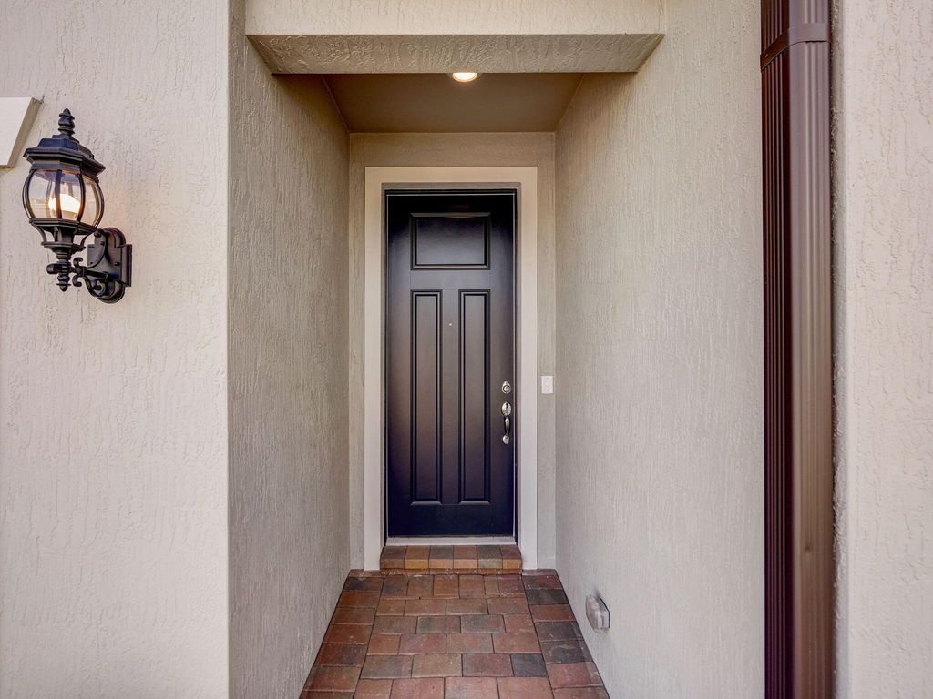 Photo of 762 SE Courances Drive, Port Saint Lucie, FL 34984 (MLS # R10964946)