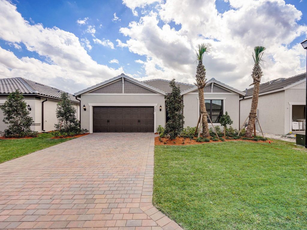 Photo of 762 SE Courances Drive, Port Saint Lucie, FL 34984 (MLS # R10964946)