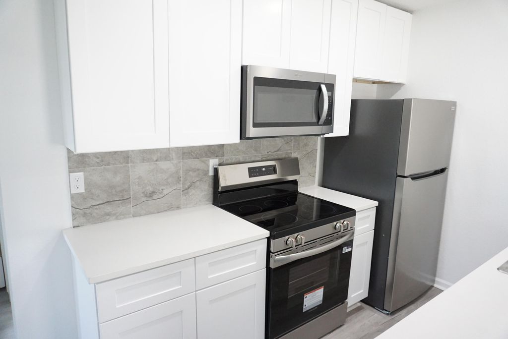 Photo of 1173 W 28th Street #2, Riviera Beach, FL 33404 (MLS # B26023198)