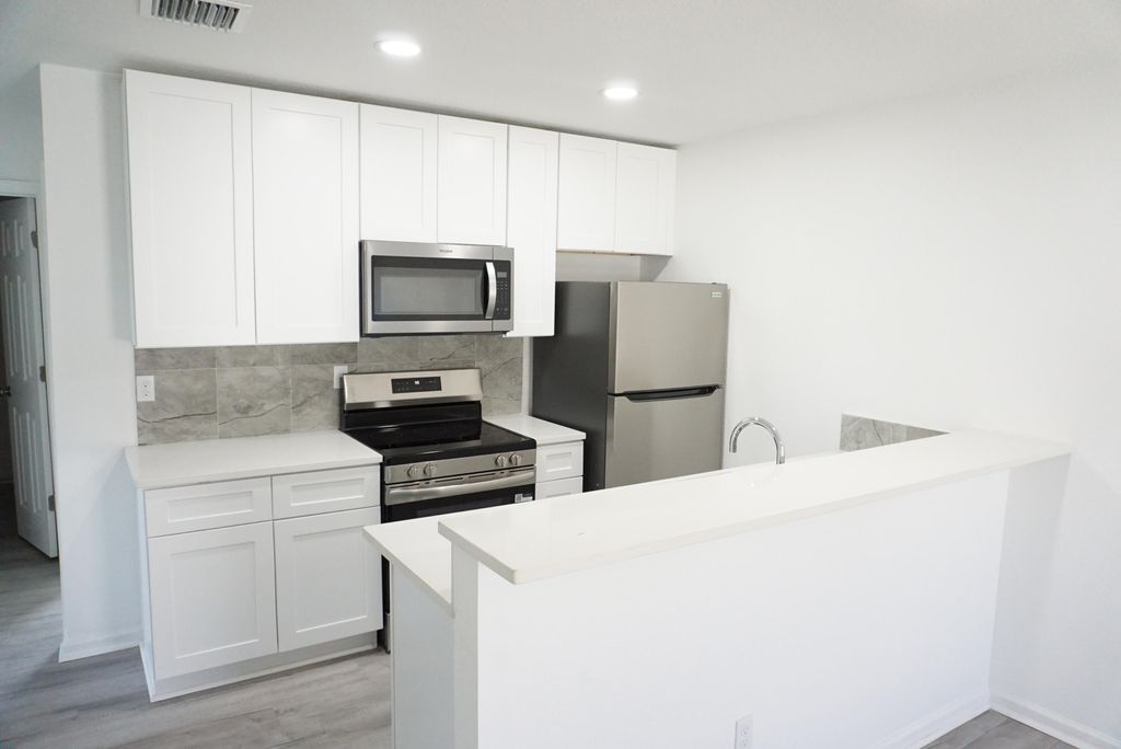 Photo of 1173 W 28th Street #2, Riviera Beach, FL 33404 (MLS # B26023198)