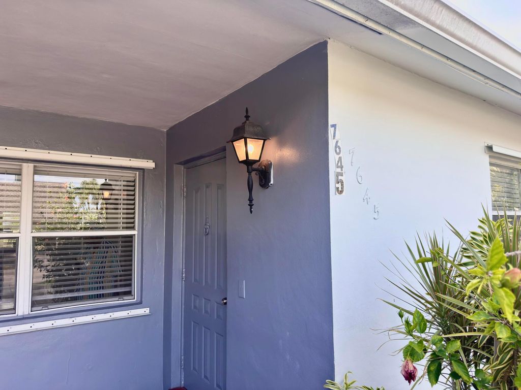 Photo of 7643 NW 74th Avenue #1-2, Tamarac, FL 33321 (MLS # B26046567)