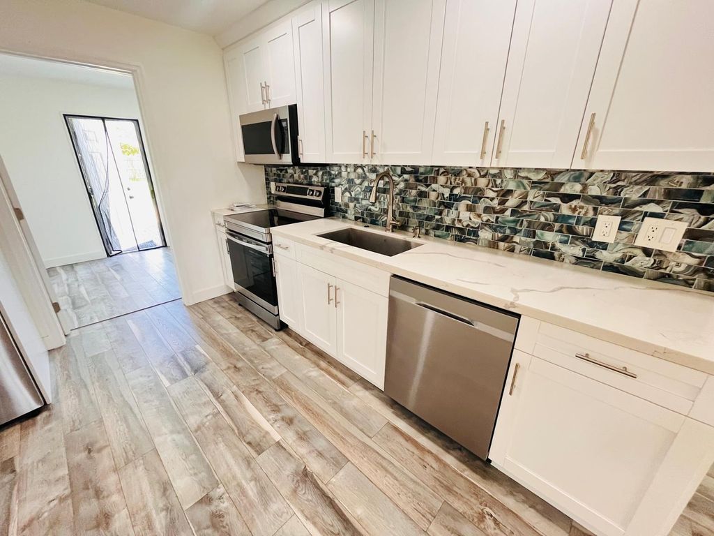 Photo of 3661 Laurette Lane, Lake Worth, FL 33461 (MLS # R11107618)