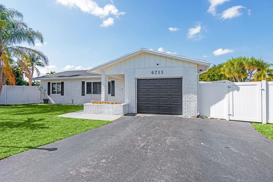 Rare Opportunity To Own A Completely Renovated Home On A HUGE LOT In Fort Lauderdale. ALL Hurricane Impact Windows And Doors, Quartz Countertops, Tile Floors Throughout Entire Home, New Roof, New AC, New PVC Fence, New Washer/Dryer, New Hot Water Heater, Tesla Charger In The Garage. Very Private Waterfront Property On The Cul-de-sac. NO HOA, LOCATION - LOCATION - LOCATION. In The South Side Of Palm Aire Village! Close To Everything; Dining, Entertainment, Beaches, Golf, And The Inter Miami Stadium. Soooo Much Room For A Massive Oasis, Pool, Pickle-ball Court Or Whatever Your Heart Desires. Make This Your Dream Home And You Probably Won’t Ever Leave. Custom Built Chicken Coup And Chickens Can Be Included In The Sale.