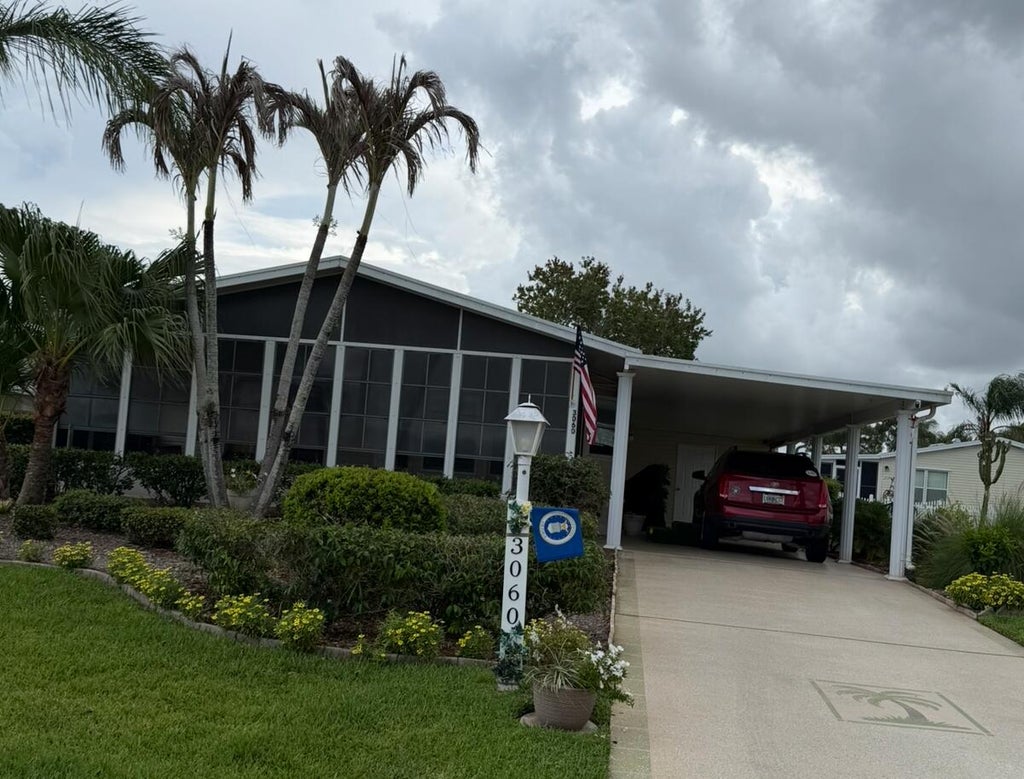 Photo of 3060 Five Iron Drive, Port Saint Lucie, FL 34952 (MLS # B26061403)