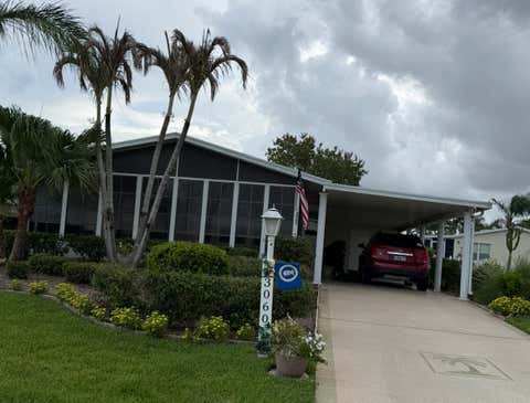 Photo of 3060 Five Iron Drive, Port Saint Lucie, FL 34952 (MLS # B26061403)