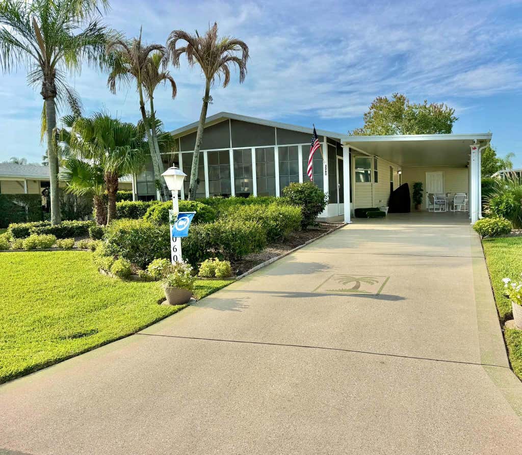 Photo of 3060 Five Iron Drive, Port Saint Lucie, FL 34952 (MLS # B26061403)