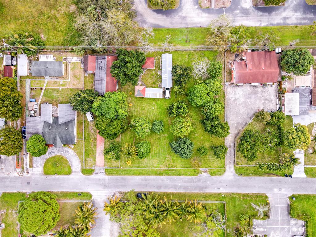 Take a look at this large residential lot located in a quiet neighborhood. It's truly a unique opportunity to start from scratch on land and build your dream home!