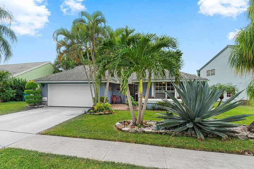 Sort after beautiful neighborhood with gated entrance; waterfront home  House is really 3 bedrooms but owner electred to have more living space.  Easy to make into 3rd bedroom; Kitchen remodeled with coriane counter tops double sink,french doors with enclosed mini blinds out to the picture perfect 400 sq ft screen room with view of beautiful lake.  laminate flooring, roof replaced 2004, accordian shutters, garage is under ac also. sprinkler systems runs off the lake water.Low hoa fee which encloses cable.