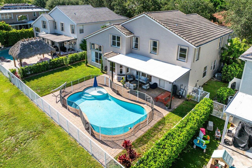 Photo of 6376 Shadow Tree Lane, Lake Worth, FL 33463 (MLS # R11154514)