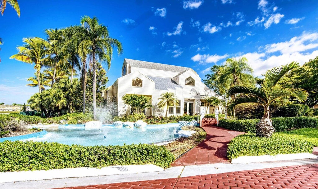 Photo of 3469 NW 44th Street #101, Oakland Park, FL 33309 (MLS # B26056123)