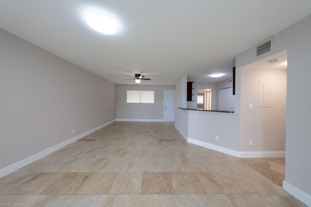 Photo of 3469 NW 44th Street #101, Oakland Park, FL 33309 (MLS # B26056123)