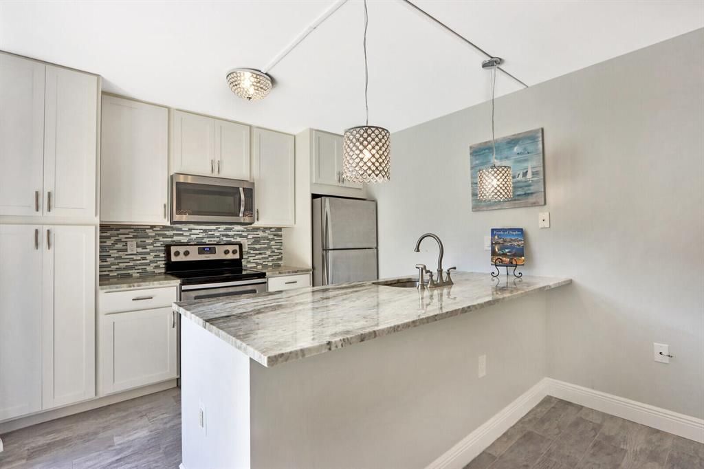 Photo of 3225 32nd Court, Jupiter, FL 33477 (MLS # R10785332)