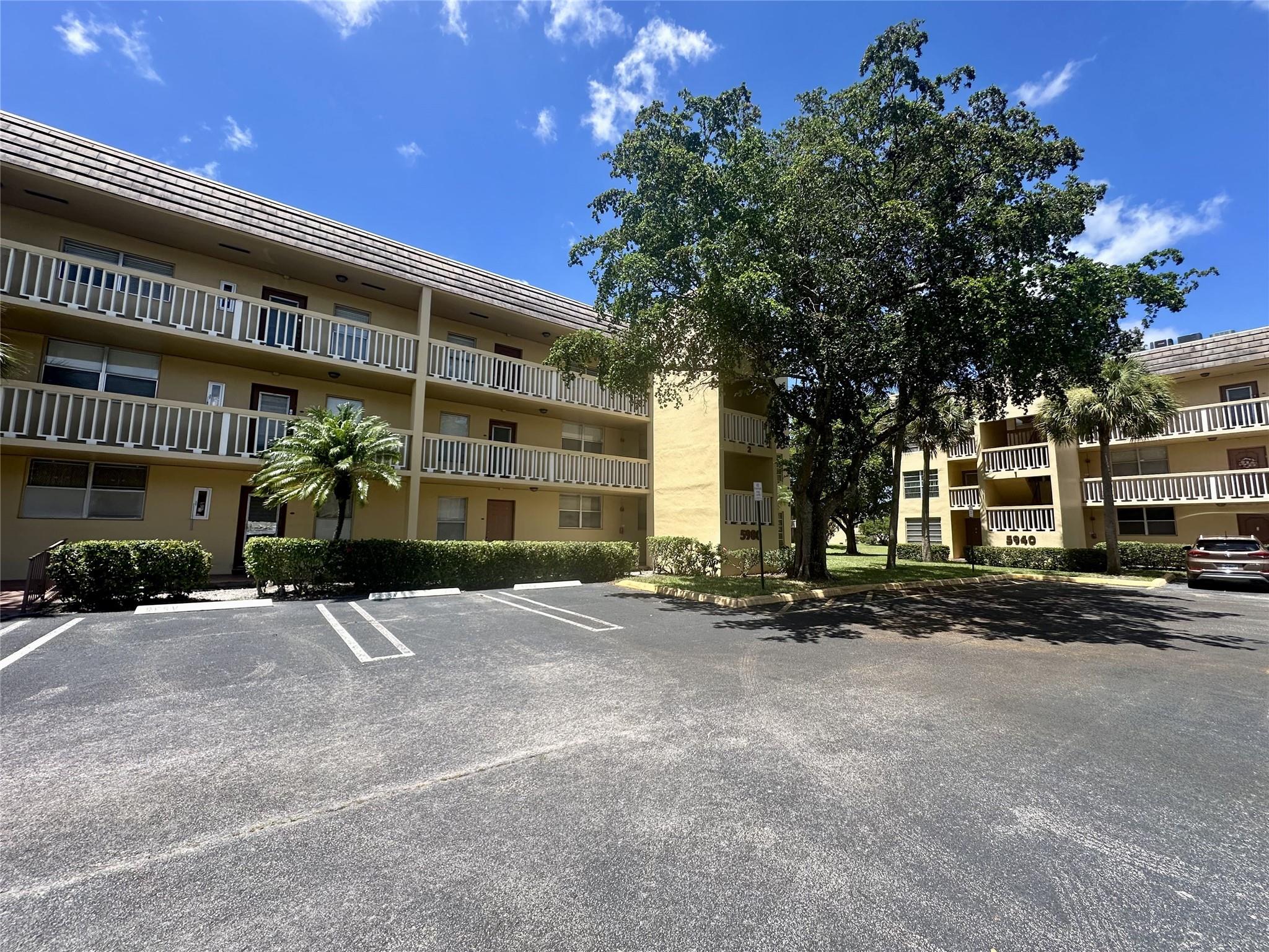First Floor! Spacious 2-bedroom, 2-bath condo in the 55+ community of Bermuda Club in Tamarac. This home offers a bright living area with tile flooring, a functional galley kitchen, and a screened patio for extra space. Both bedrooms feature walk-in closets, with the primary suite offering a private bath and step-in shower. Community amenities include a large pool, clubhouse, fitness center, tennis courts, and walking paths. Conveniently located near shopping, dining, golf, and major highways, this condo blends comfort, value, and an active lifestyle.