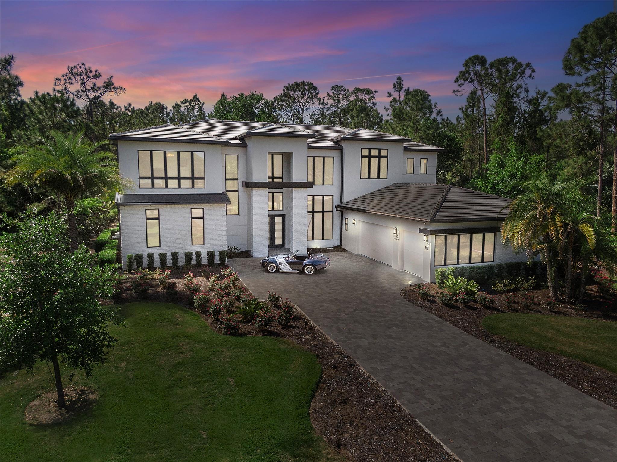 This breathtaking 6-bed, 7.5-bath estate spans nearly 7,000 sq. ft., radiating elegance, warmth, and natural light. Every inch is designed for luxury, from the showstopping home theater with plush recliner seating to the grand primary suite, a private spa-like retreat. The gourmet kitchen is a chef’s paradise, boasting premium finishes and endless cabinet space. Nestled in the prestigious Bella Collina, this home offers more than just luxury—it delivers an extraordinary lifestyle. Tee off on the stunning Nick Faldo-designed golf course, indulge in world-class dining, or unwind at the spa. With tennis and pickleball courts, a resort-style pool, and a top-tier fitness center, every day feels like a five-star getaway!
