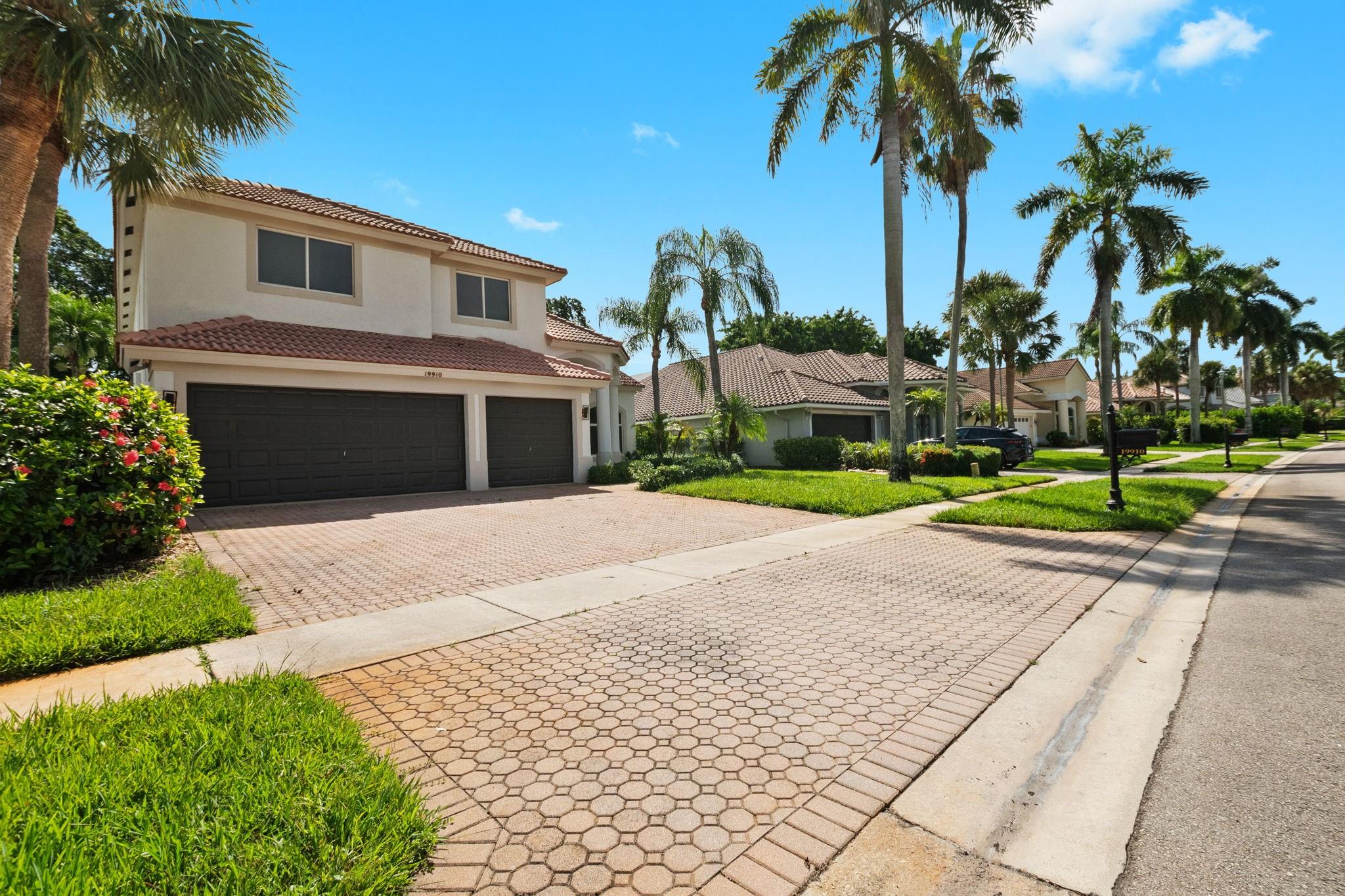 Welcome to the luxurious guard gated community of Boca Isles South surrounded by excellent schools. The community features a newly renovated clubhouse with state of the art gym, resort pool, playgrounds, tennis and basketball. It offers a lifestyle to behold. 19910 is one of the most spacious models available with 2934 sq ft. There are 4 beds/3 baths and separate living, dining and family rooms all centered around the recently updated kitchen with newer appliances. One bed/bath is located on the 1st floor with 3 more upstairs including the massive primary with balcony. The home was recently painted, has a 3 car garage, updated baths, newer flooring and huge screened pool and patio. The location is ideal with easy access to major highways and plenty of nearby shopping and dining.