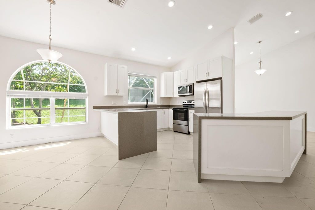 Photo of 19910 Dinner Key Drive, Boca Raton, FL 33498 (MLS # F10524726)