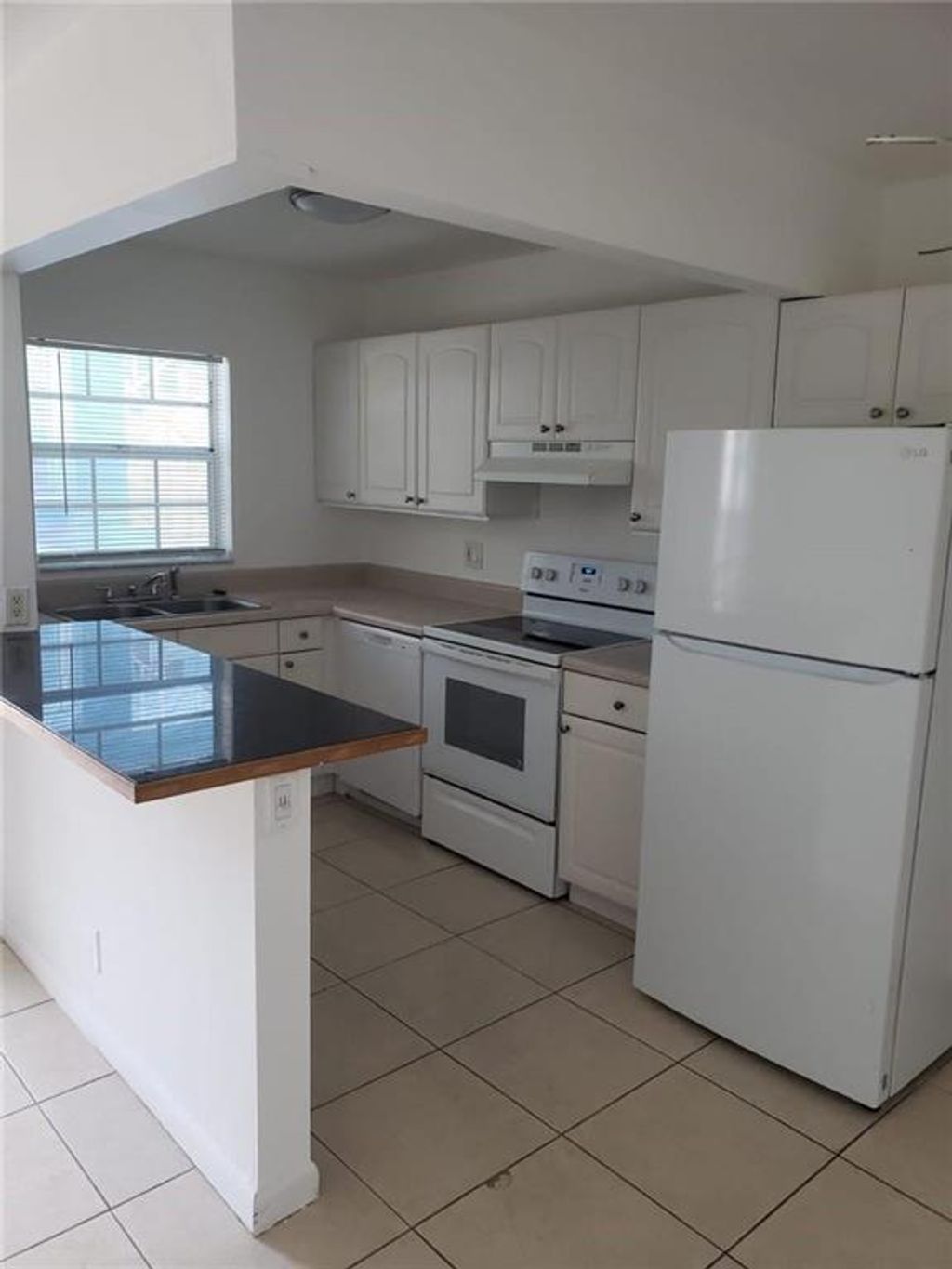 Photo of 4951 Wedgewood Way #2, West Palm Beach, FL 33417 (MLS # B26005502)