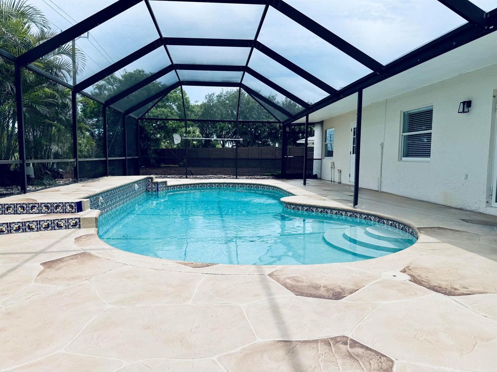 Photo of 22592 Lombard Avenue, Boca Raton, FL 33428 (MLS # R11104645)