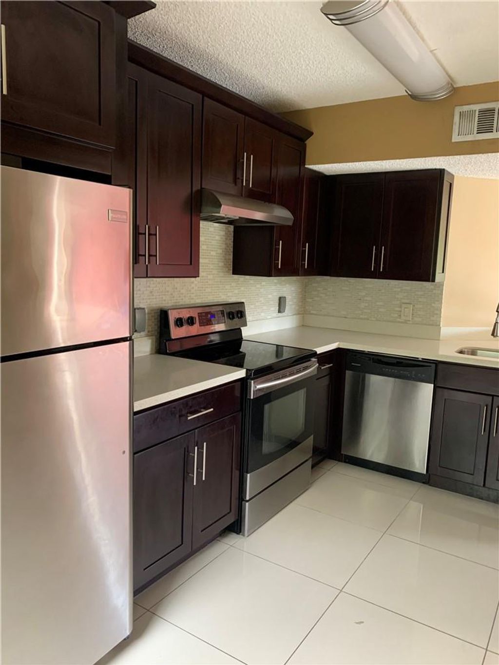 Photo of 8891 Wiles Road #308, Coral Springs, FL 33067 (MLS # F10504247)
