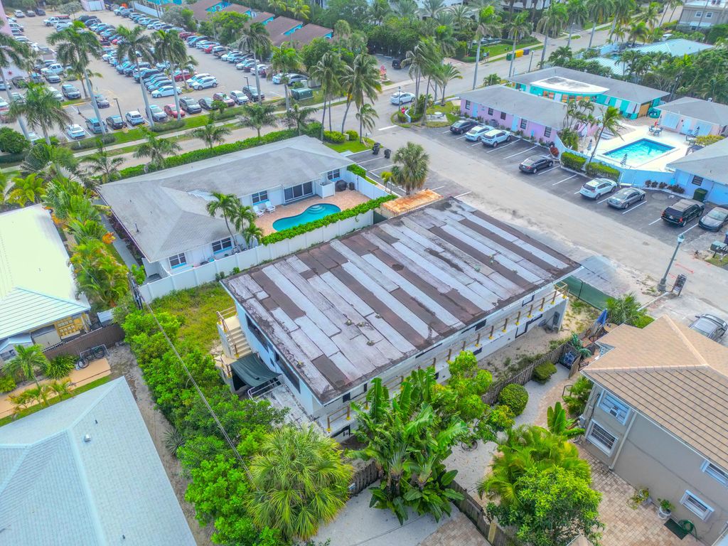 Photo of 107 Sandal Lane, Palm Beach Shores, FL 33404 (MLS # R10938072)