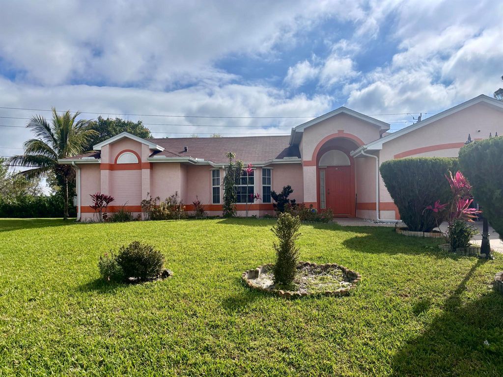 Photo of 3061 SE Wake Road, Port Saint Lucie, FL 34984 (MLS # R11066891)