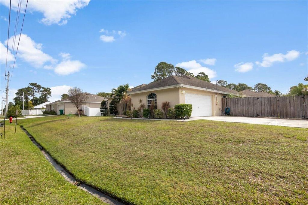 Photo of 4117 SW Rosser Boulevard, Port Saint Lucie, FL 34953 (MLS # R10983076)