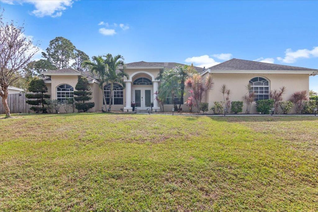 Photo of 4117 SW Rosser Boulevard, Port Saint Lucie, FL 34953 (MLS # R10983076)
