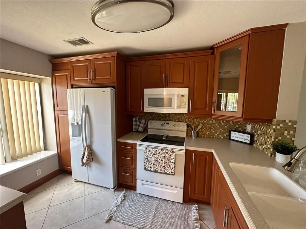 Photo of 9352 NW 44th Court, Sunrise, FL 33351 (MLS # F10375795)