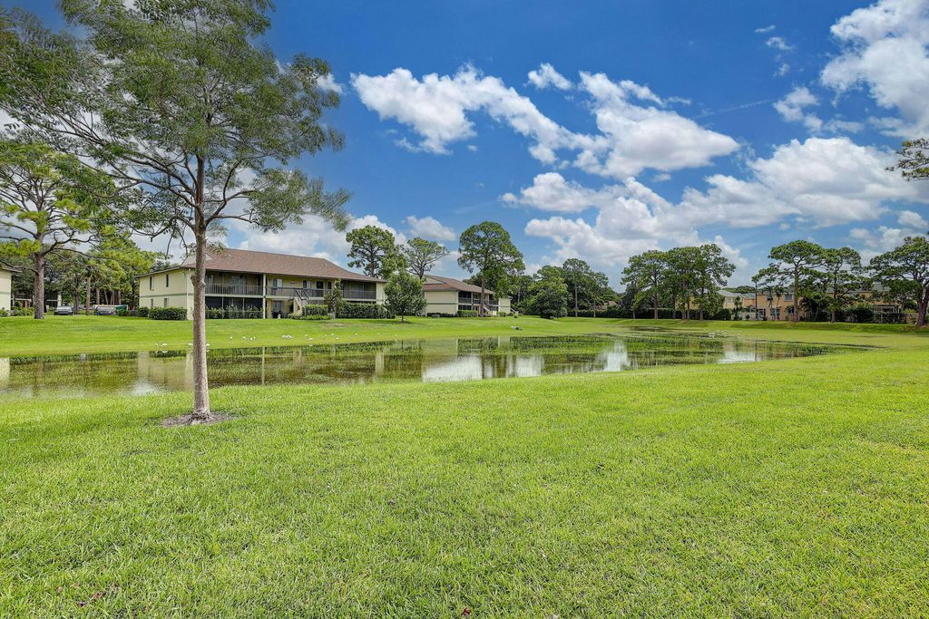 Photo of 6299 Chasewood Drive #G, Jupiter, FL 33458 (MLS # R11010268)