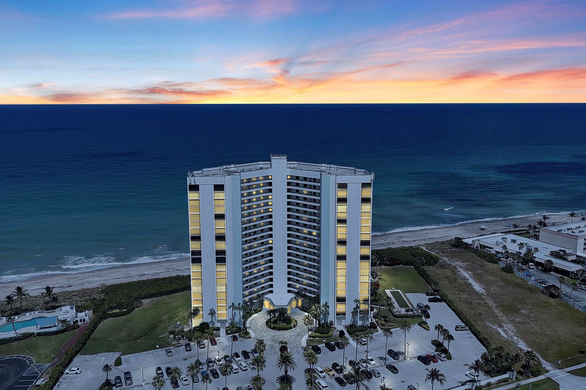 Experience coastal living at its finest in this fully renovated, art deco-inspired condo in the prestigious Princess Condominium on Hutchinson Island. This stunning residence offers sweeping ocean views from the rear and picturesque Intracoastal vistas from the front--truly the best of both worlds.Step inside to discover a beautifully curated interior, fully furnished with elegant, modern decor. Every detail has been thoughtfully selected, from the sleek finishes to the impact-rated sliding glass doors that frame the breathtaking scenery. Move-in ready, this residence requires nothing more than your toothbrush.