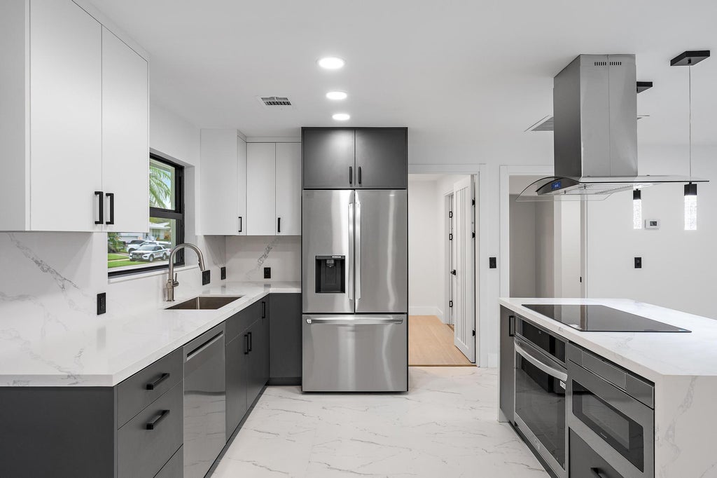 Photo of 360 Saturn Avenue, Tequesta, FL 33469 (MLS # B26069435)