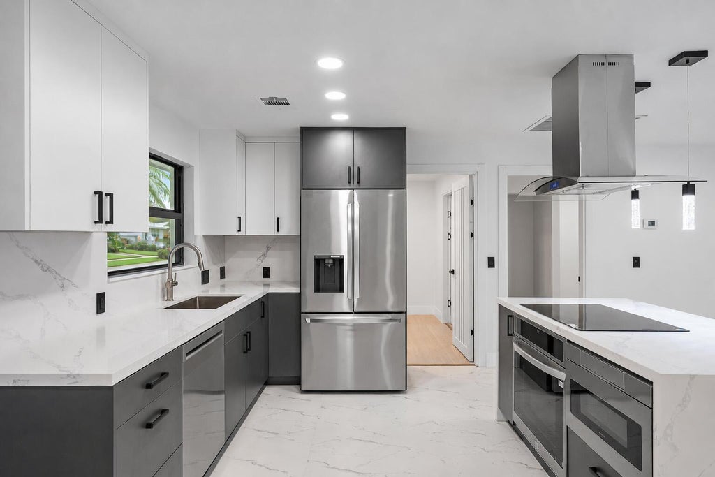 Photo of 360 Saturn Avenue, Tequesta, FL 33469 (MLS # B26069435)