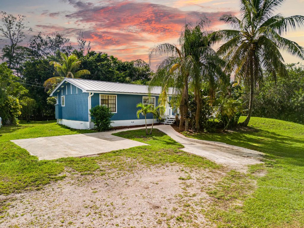 Photo of 15827 93rd Lane N, Jupiter, FL 33478 (MLS # R10997152)