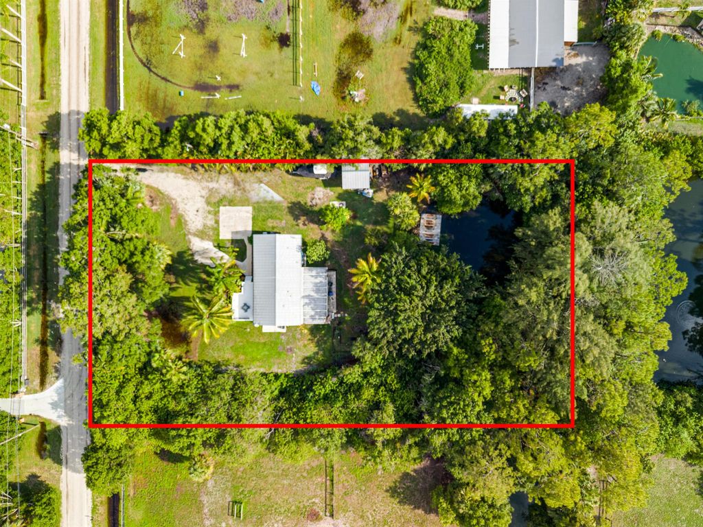 Photo of 15827 93rd Lane N, Jupiter, FL 33478 (MLS # R10997152)